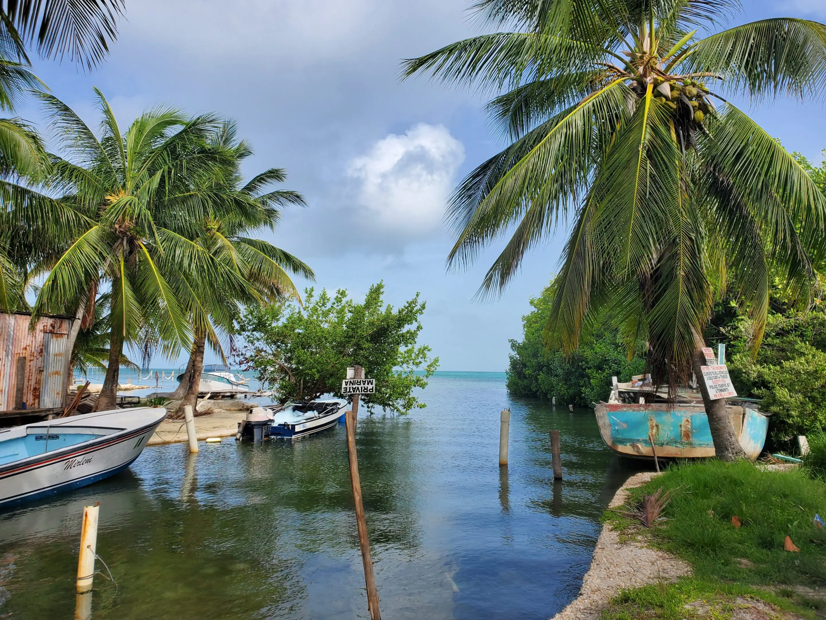 A body of water with boats parked on it.