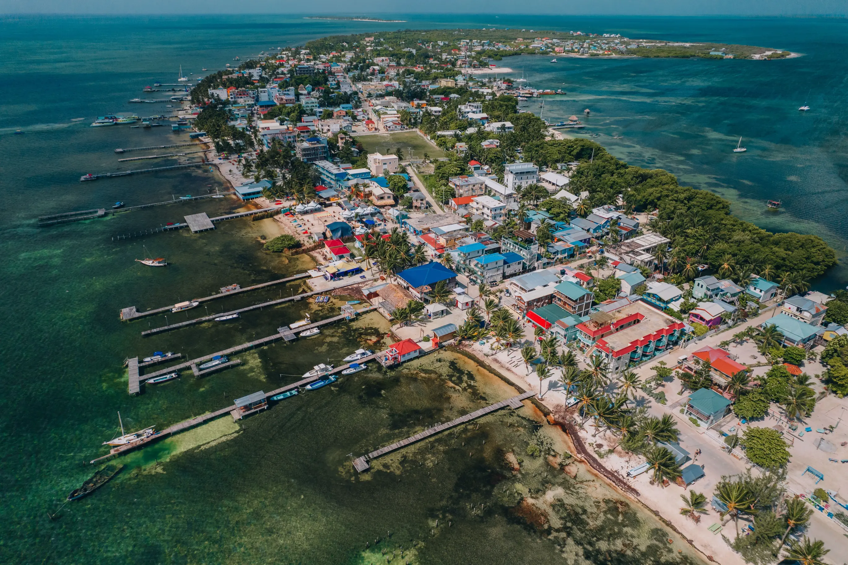 A bird 's eye view of the ocean and buildings.