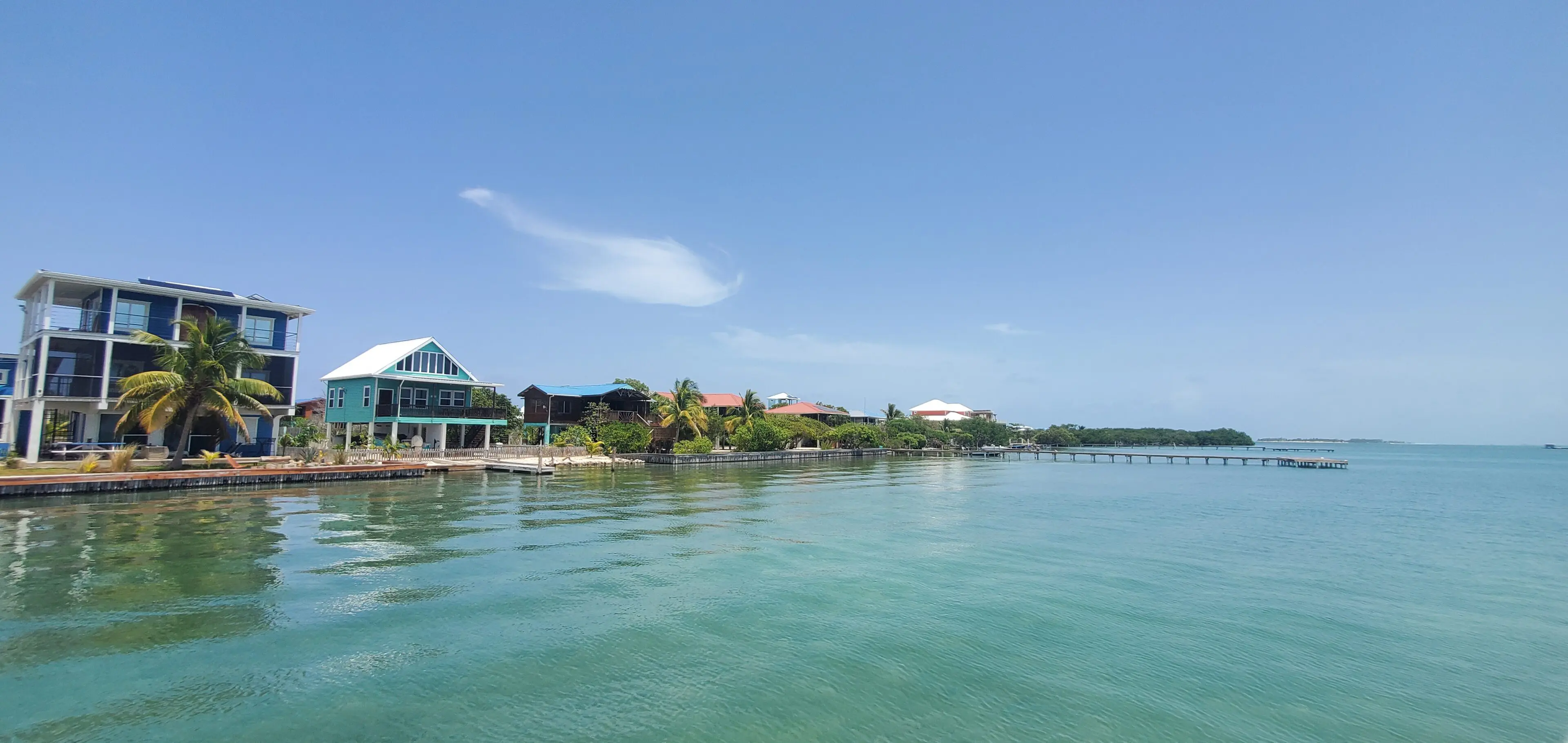 A view of houses from the water.