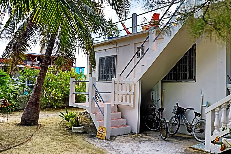 A bicycle parked in front of a house.