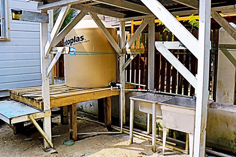 A large tank sitting in the middle of an outdoor area.