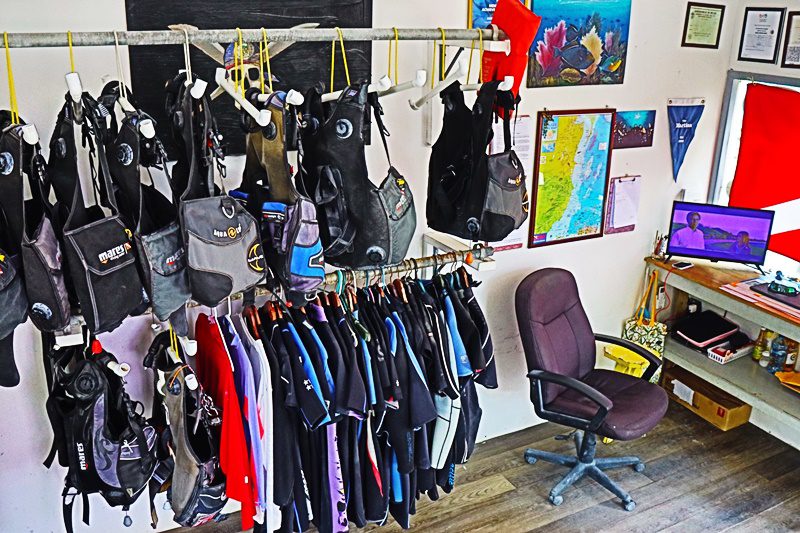 A room filled with lots of different types of scuba gear.