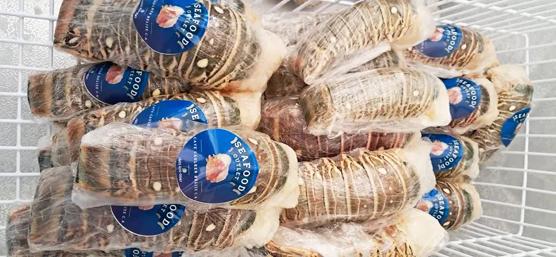 A close up of some wrapped meat in plastic