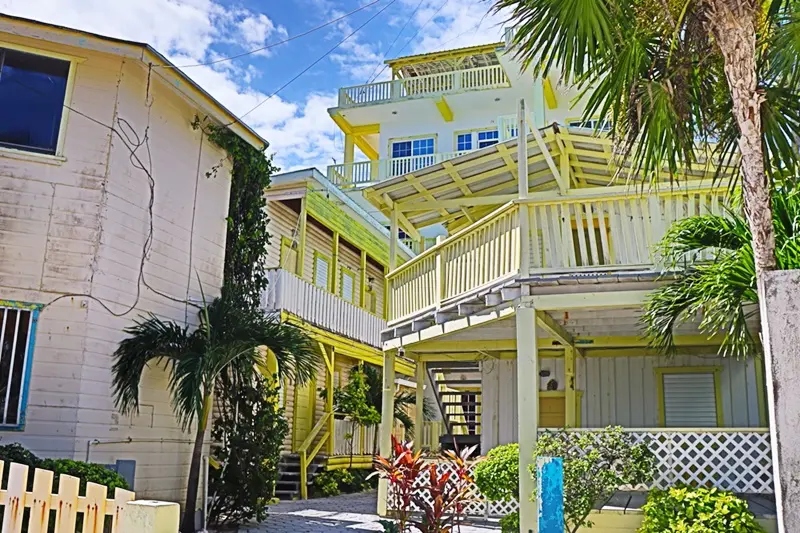 A building with stairs and steps leading to the top.