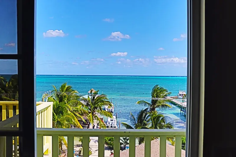 A view of the ocean from an outside balcony.