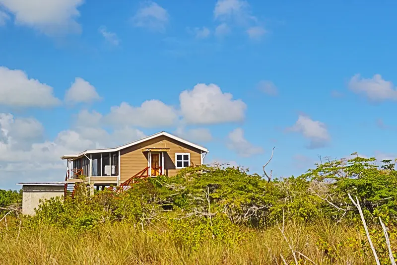 A house sitting on top of a hill.