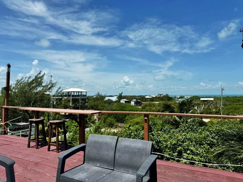 A view of the ocean from an outdoor deck.