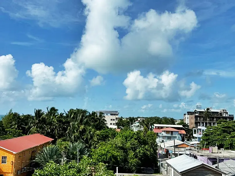 A view of the sky from above houses.