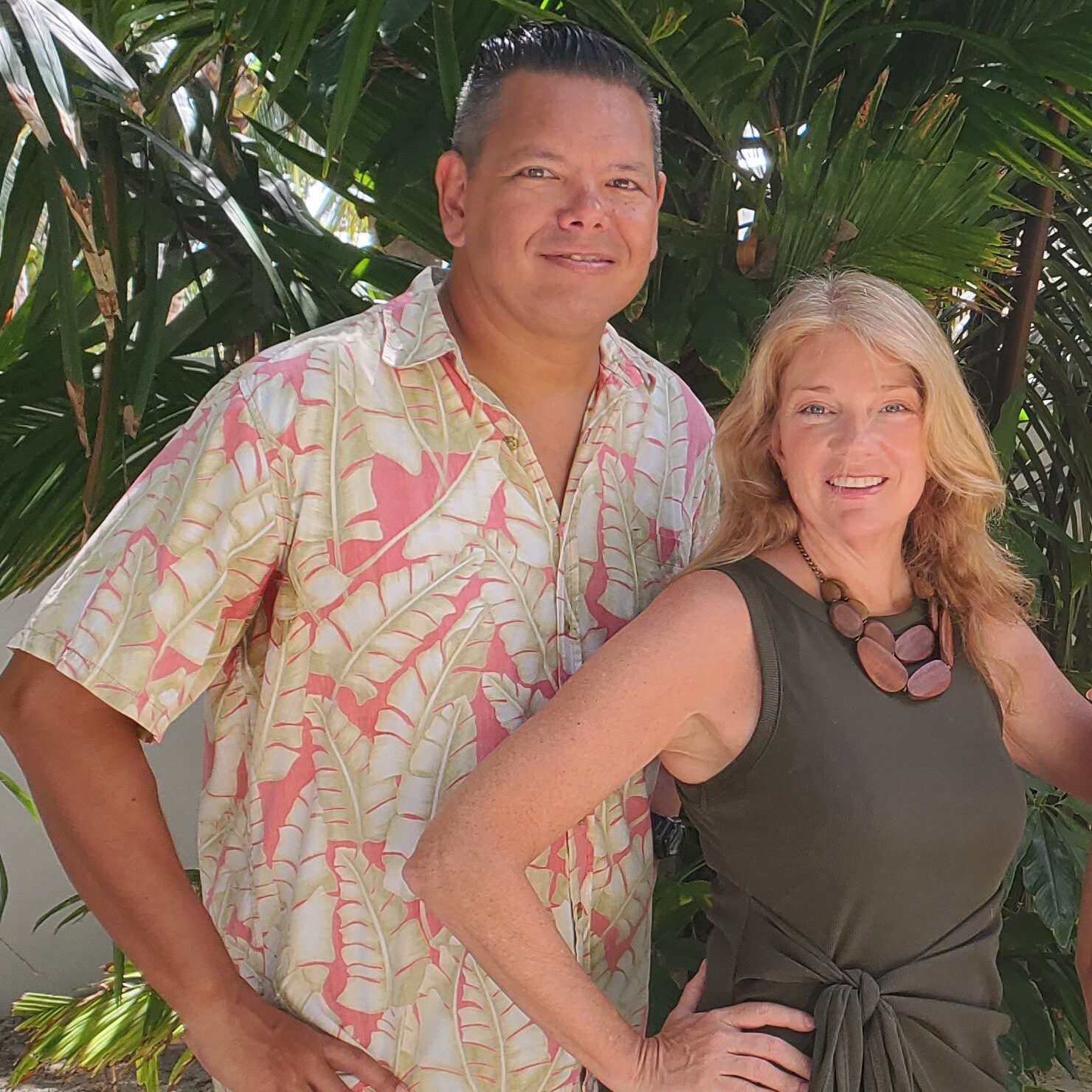 A man and woman standing next to each other.